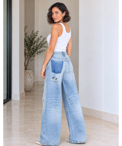 Comprar calça jeans pantalona feminina perna larga vista de costas azul claro em promoção Anellimn