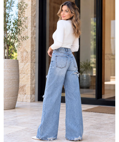 Comprar calça jeans rasgada feminina baggy azul claro vista de costas em promoção Anellimn