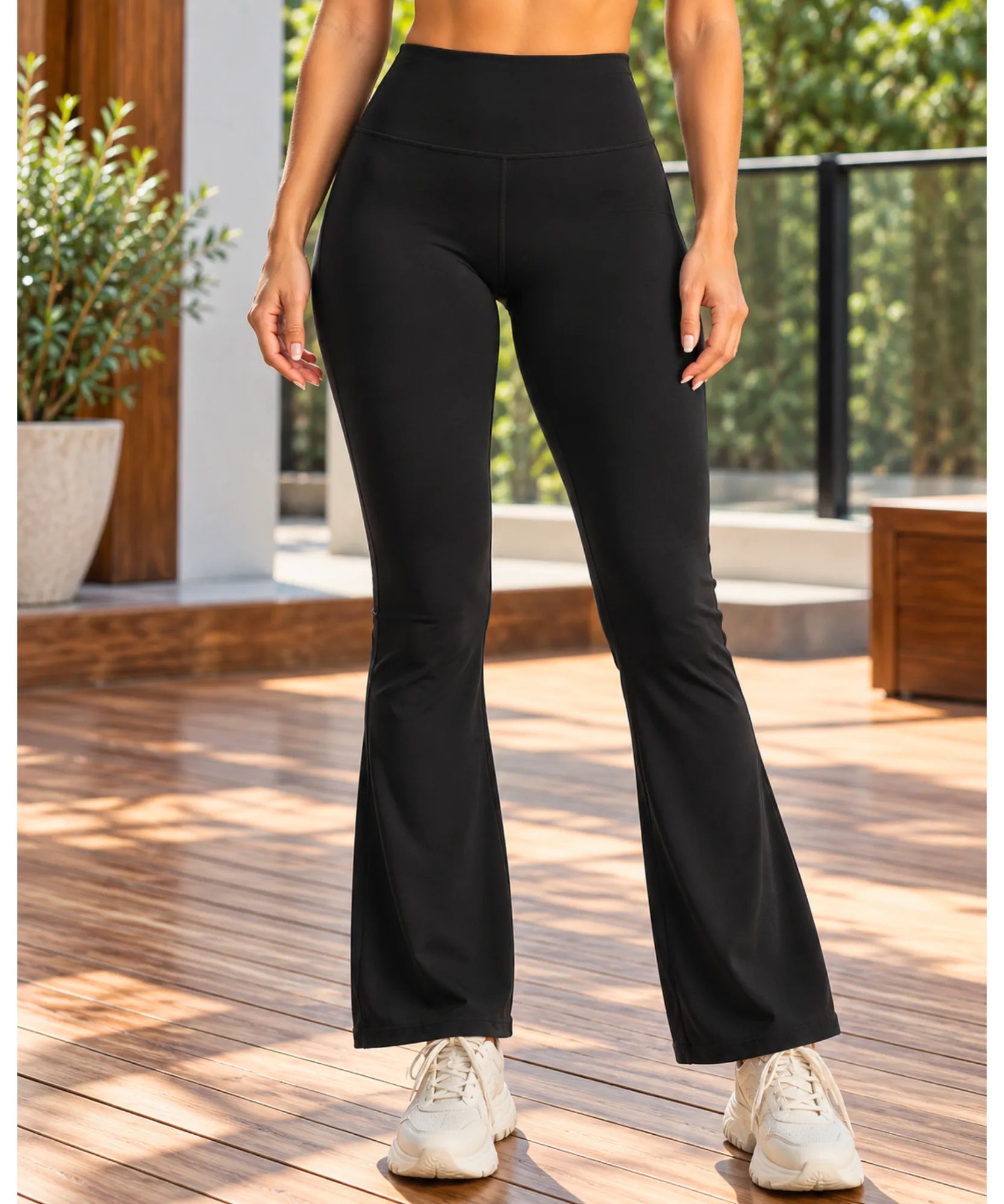 Calça legging flare preta de cintura alta vista de frente