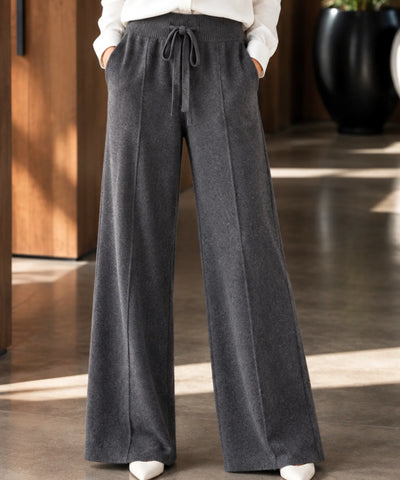 Calça de malha feminina wide leg cinza escuro com cordão de amarração no cós e bolsos laterais, vista de frente | Anellimn