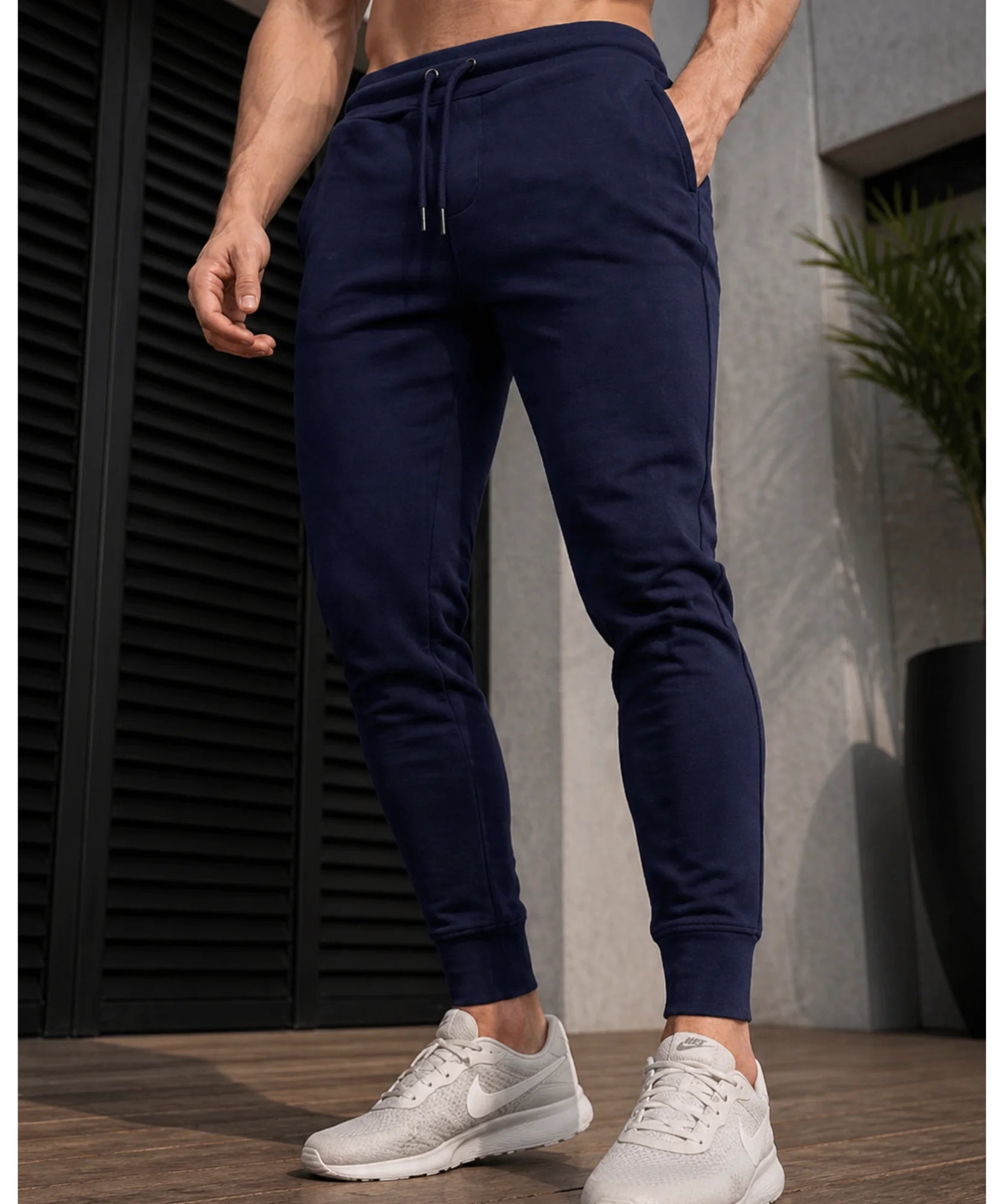 Comprar calça moletom masculina jogger slim com punho canelado e bolsos laterais para academia e treino barata ANELLIMN