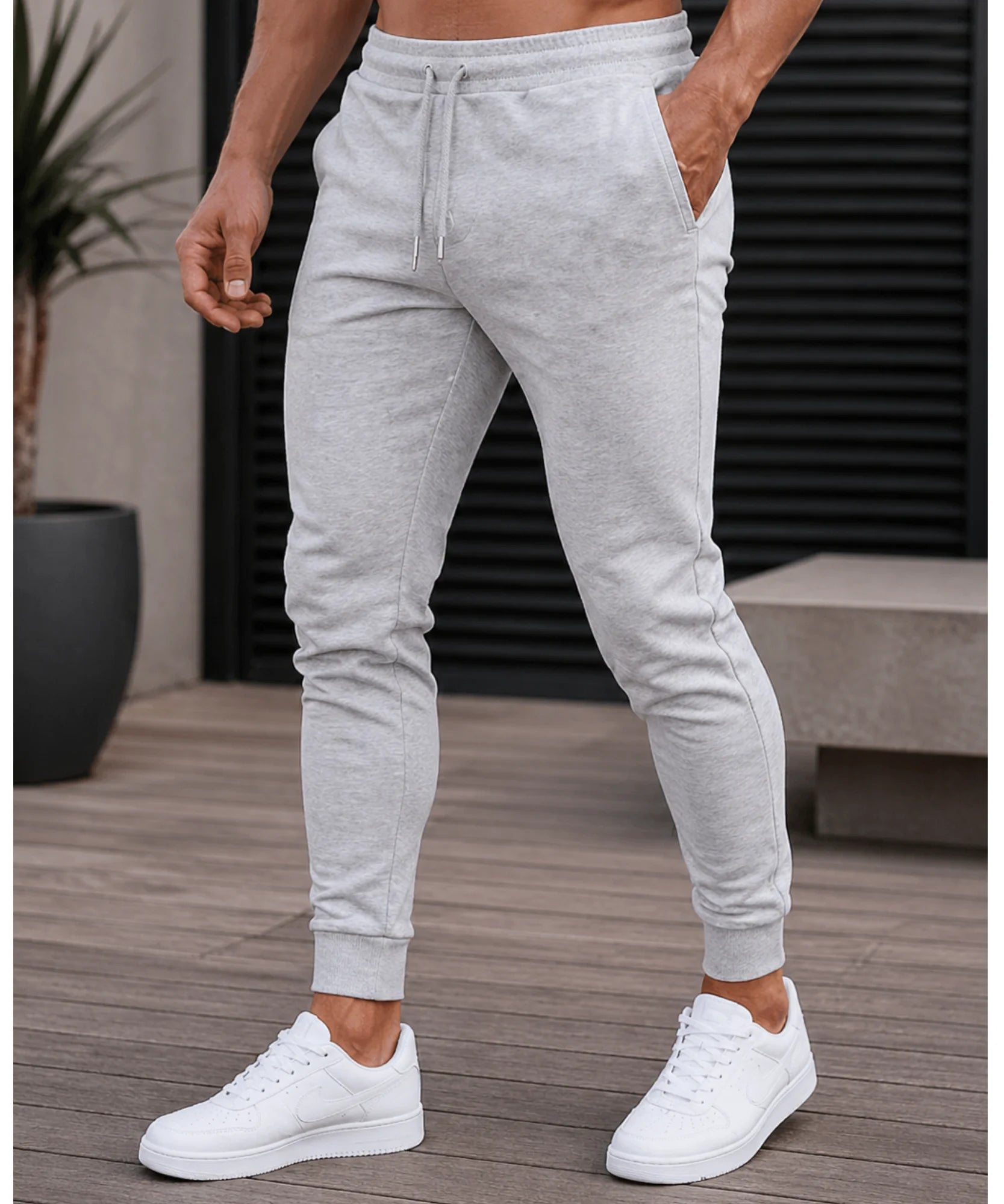Comprar calça moletom masculina jogger slim com punho canelado e bolsos laterais para academia e treino barata ANELLIMN