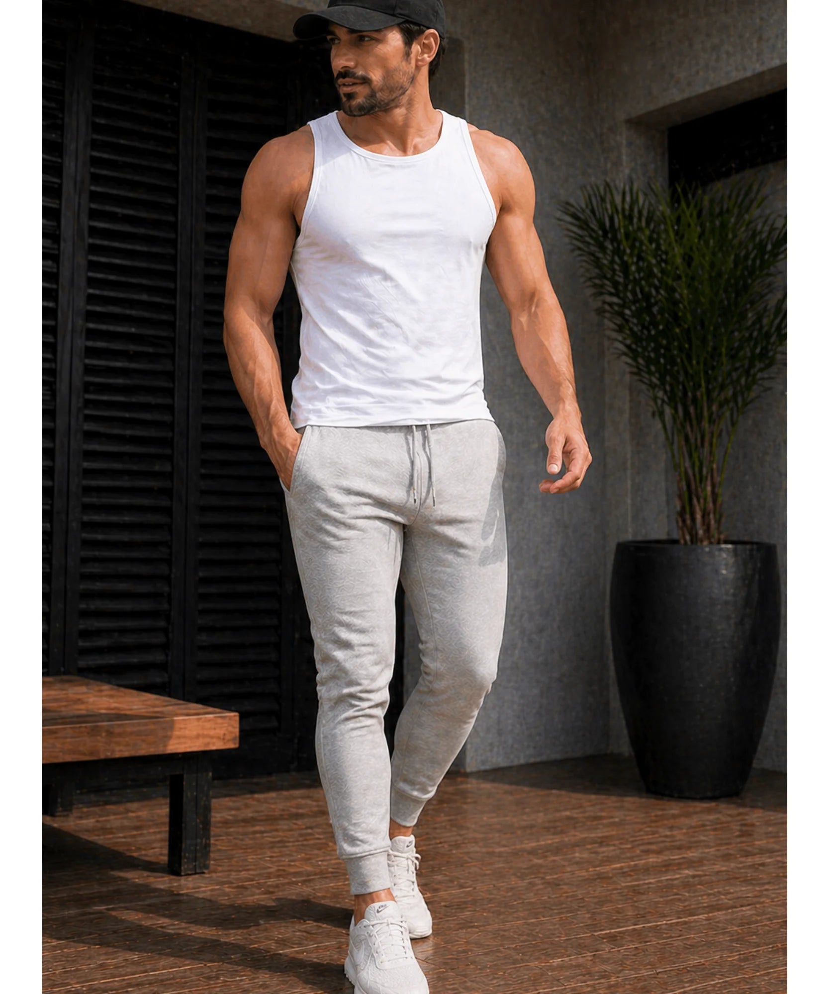 Comprar calça moletom masculina jogger slim com punho canelado e bolsos laterais para academia e treino barata ANELLIMN