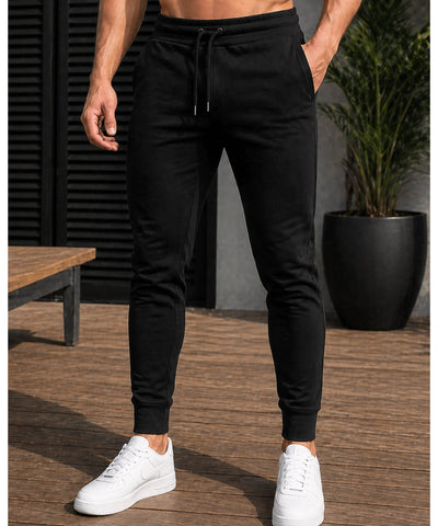 Comprar calça moletom masculina jogger slim com punho canelado e bolsos laterais para academia e treino barata ANELLIMN