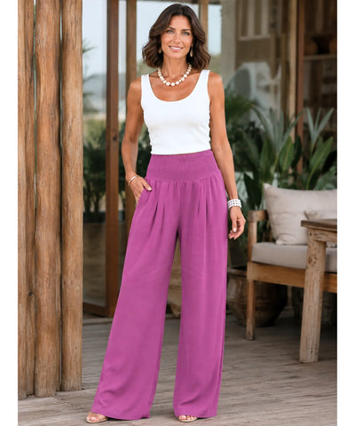 Calça pantalona feminina fluida em lilás intenso, vista de corpo inteiro na modelo