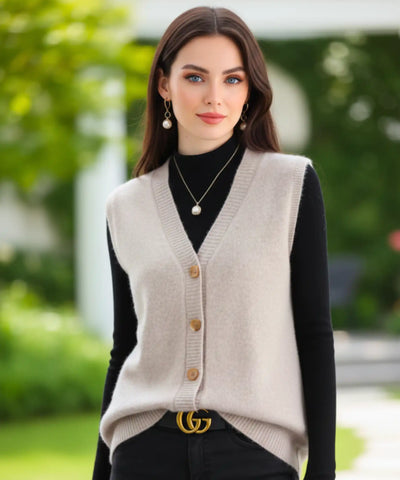 Comprar colete feminino em tricot com gola V e botões, ideal para sobrepor looks elegantes de outono e inverno em promoção ZARA

