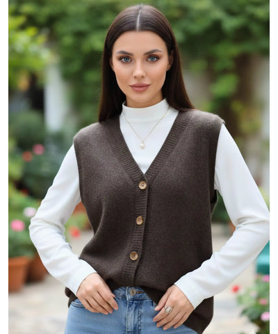 Comprar colete feminino em tricot com gola V e botões, ideal para sobrepor looks elegantes de outono e inverno em promoção ZARA

