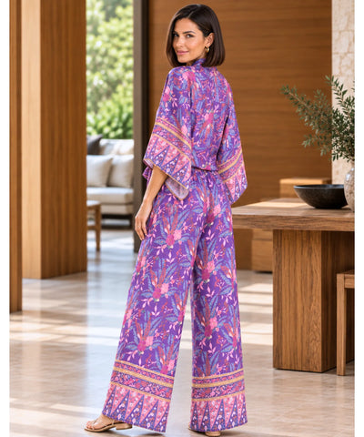 Conjunto calça e blusa feminino roxo floral, vista de costas