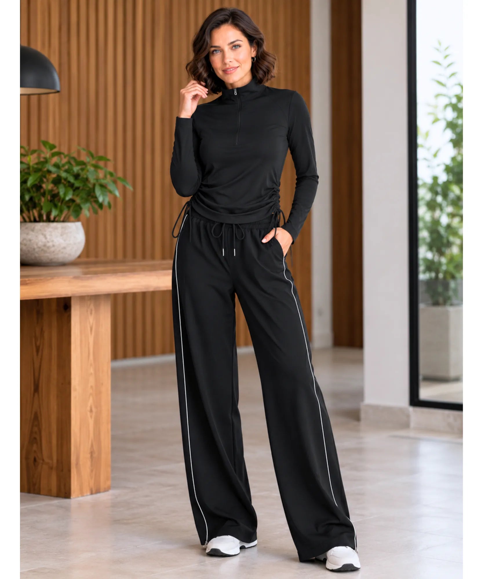 Conjunto dry fit preto de blusa manga longa e calça pantalona