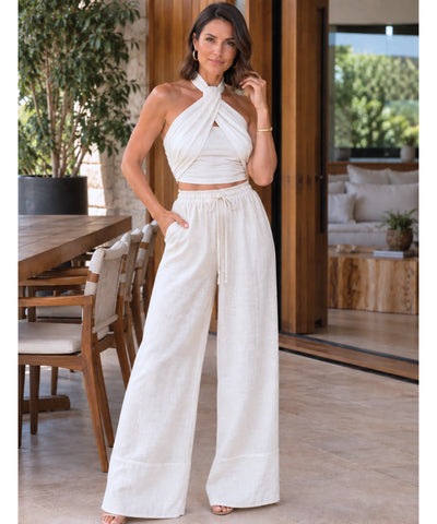 Conjunto pantalona e cropped feminino bege, close corpo frente
