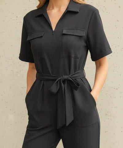 Comprar macacão alfaiataria feminino preto manga curta com amarração na cintura modelagem pantalona barato