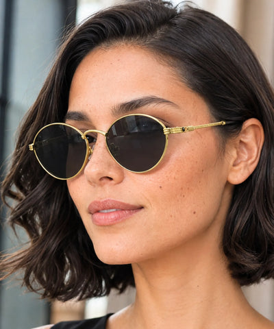 Comprar óculos de sol oval feminino dourado preto elegante em promoção Anellimn