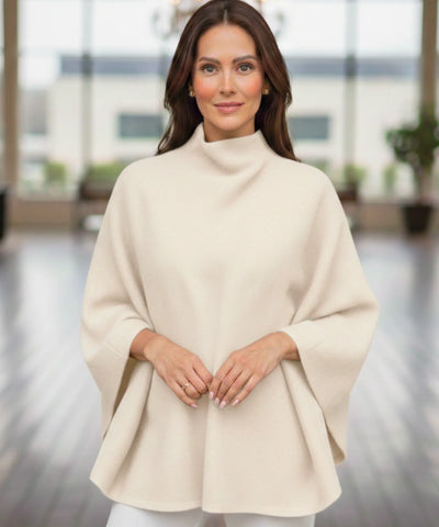 Comprar poncho feminino malha macia gola alta modelagem ampla aquecimento inverno elegante em promoção ZARA

