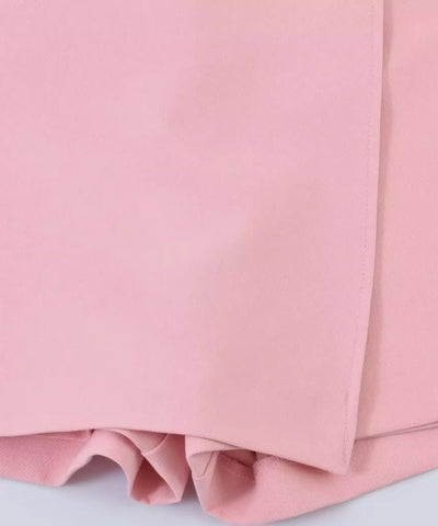 Short saia transpassado rosa em macro do tecido de poliéster